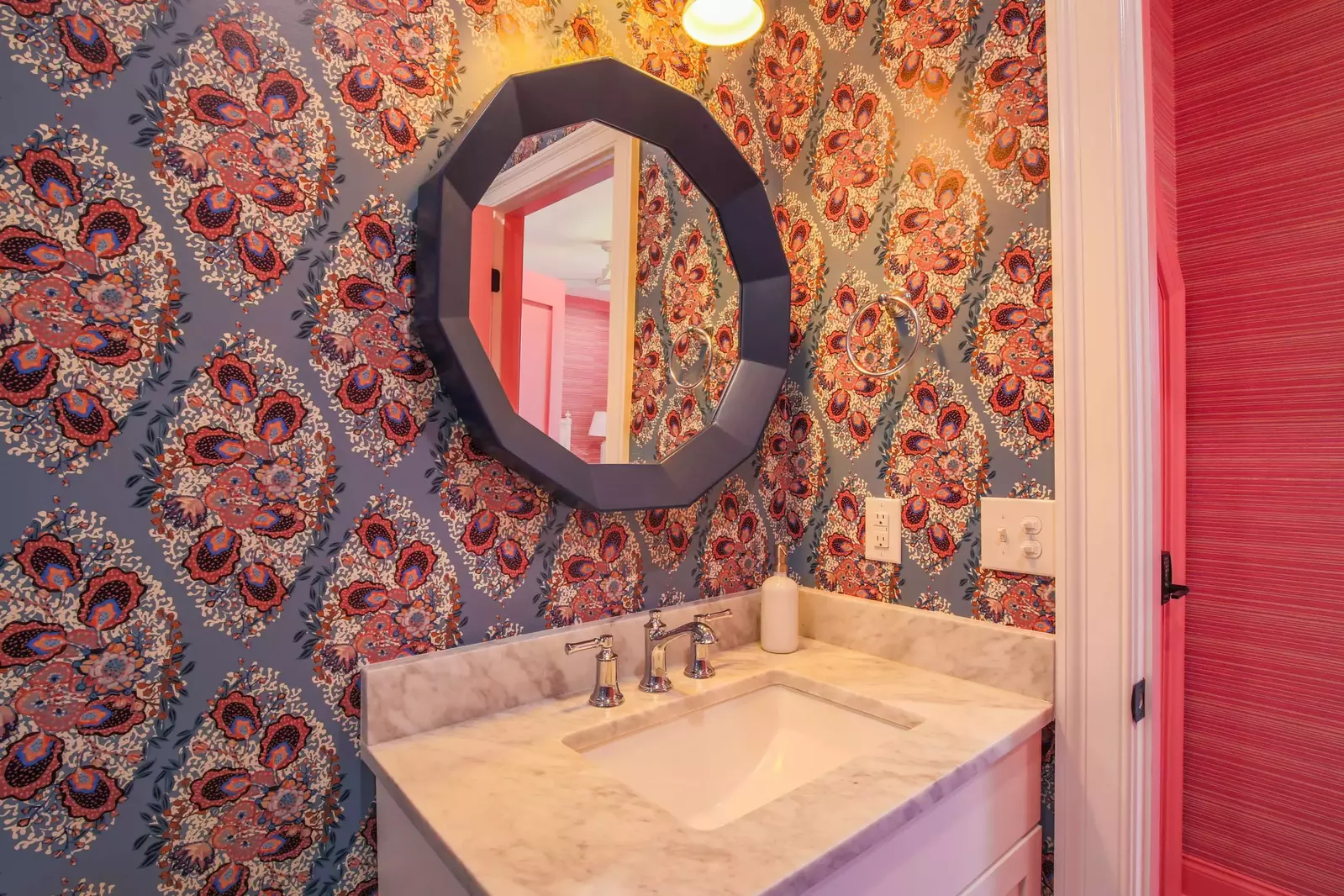 The en suite bathroom features a spacious vanity.