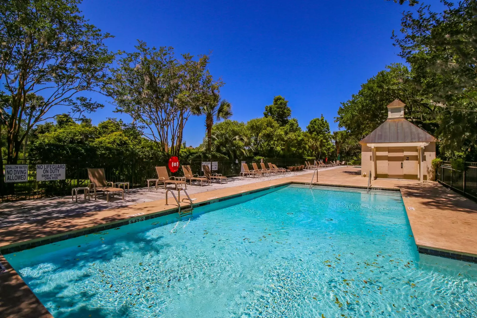 There are two changing rooms as well as many lounge chairs available for your use at the community pools.