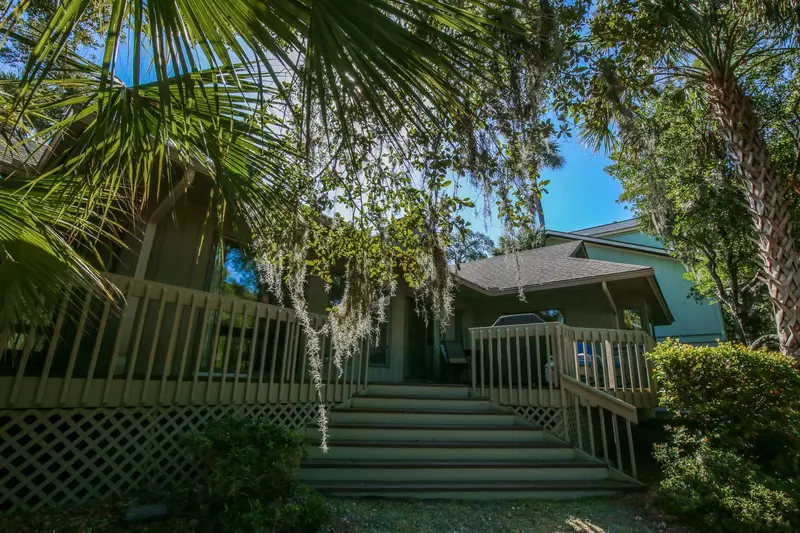 These steps off the back porch lead to the backyard and lagoon area.