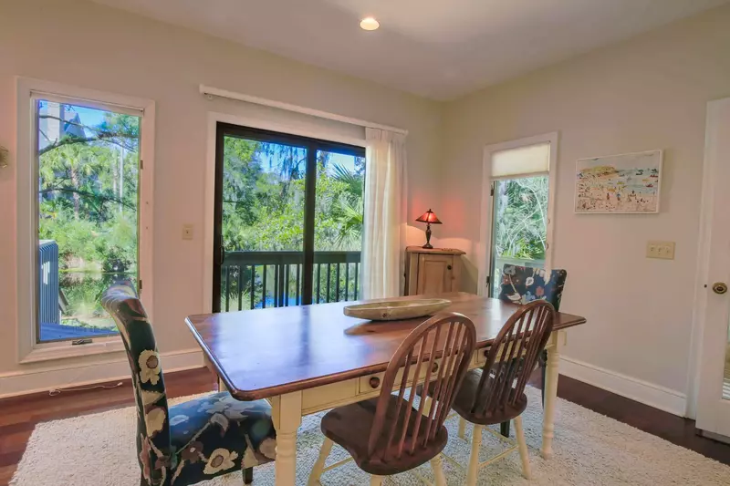 The living room and dining room look out onto the lagoon situated behind the house.