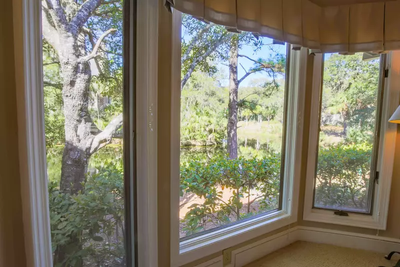 You'll never tire of the lagoon views through these bay windows in the primary suite.