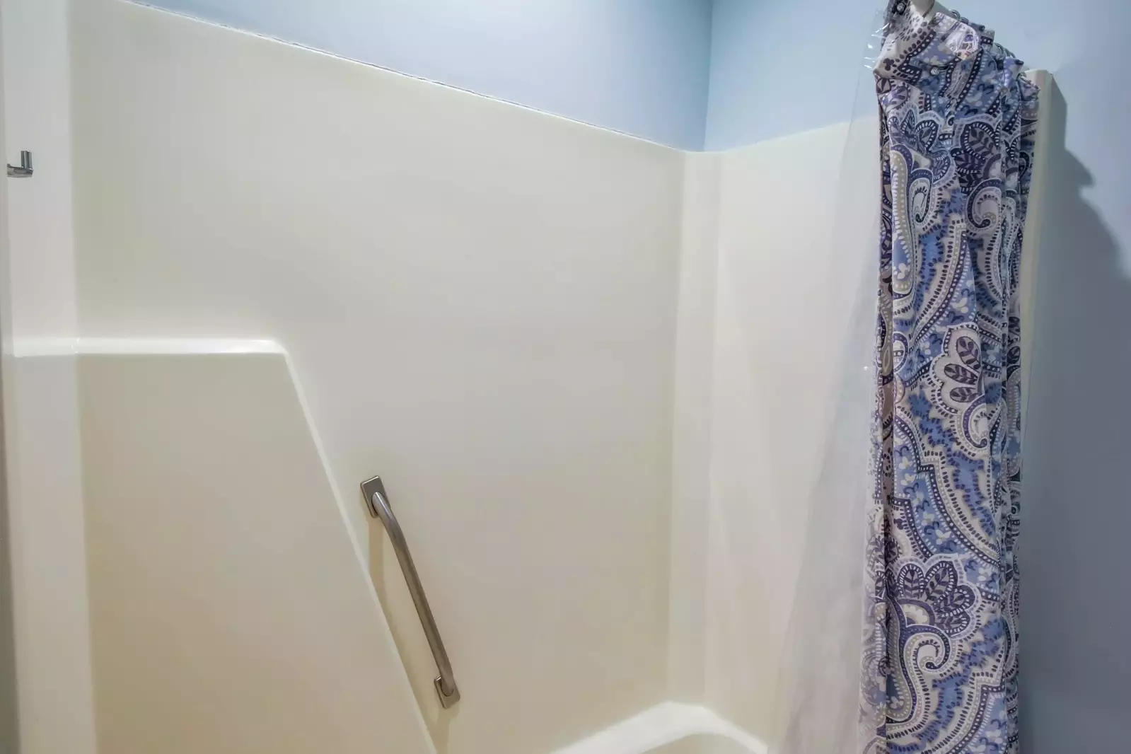 This bathroom also has a shower/tub combo.