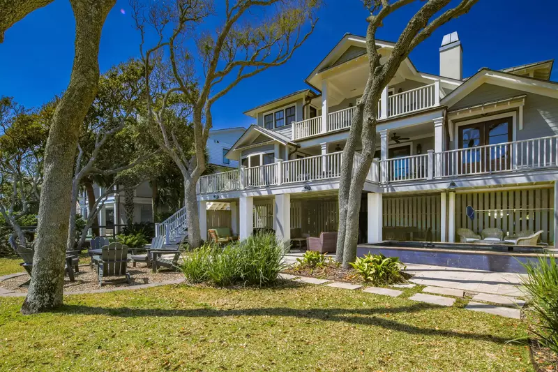 The oceanside of the home features three separate levels of patio, decks and balconies.