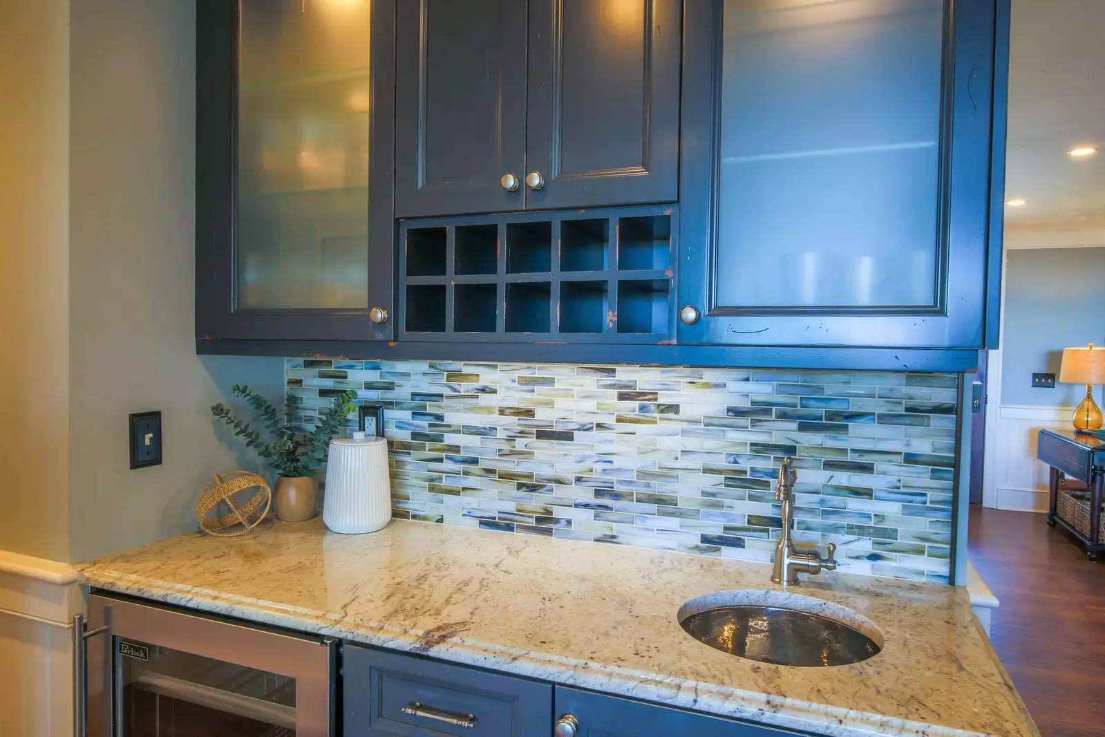 This butler's pantry is located near the living room and kitchen.