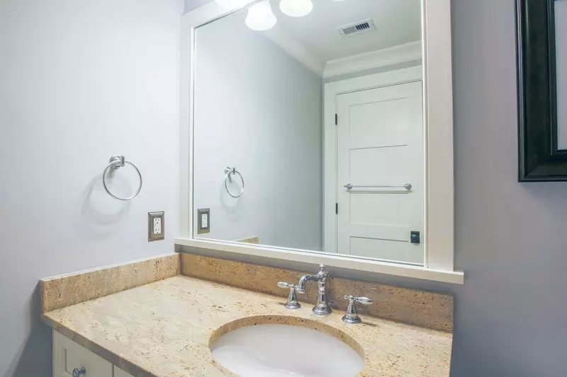 The en suite bathroom for the nautical twin bedroom has this spacious vanity.