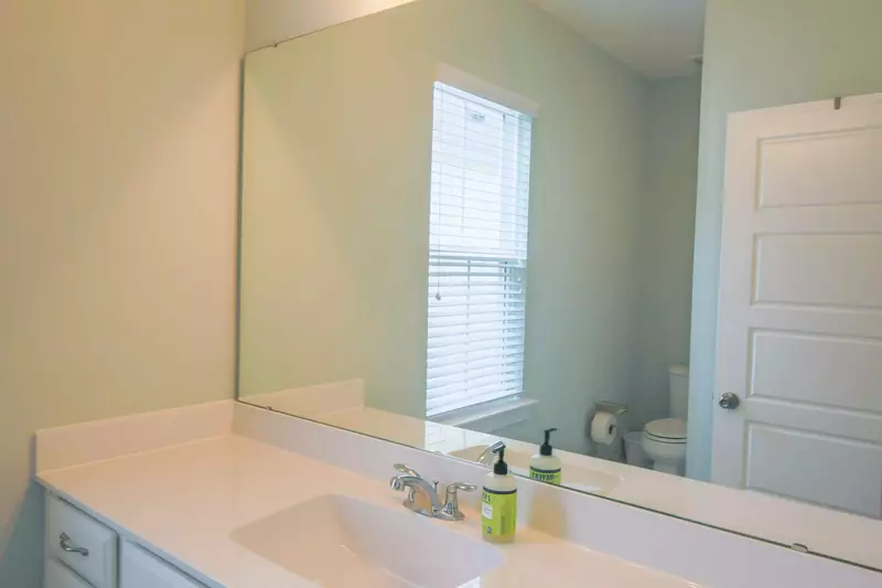 This hallway bathroom is shared by the two guest bedrooms.