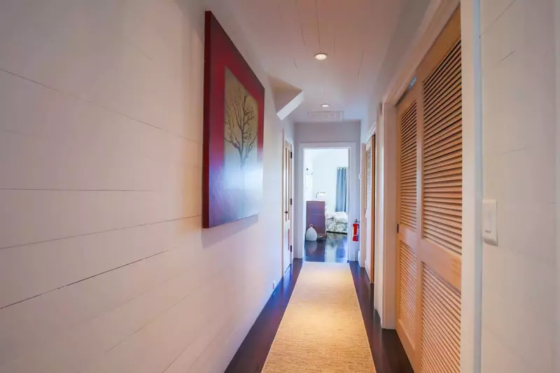 This hallway separates the two master suites on the home's second floor.