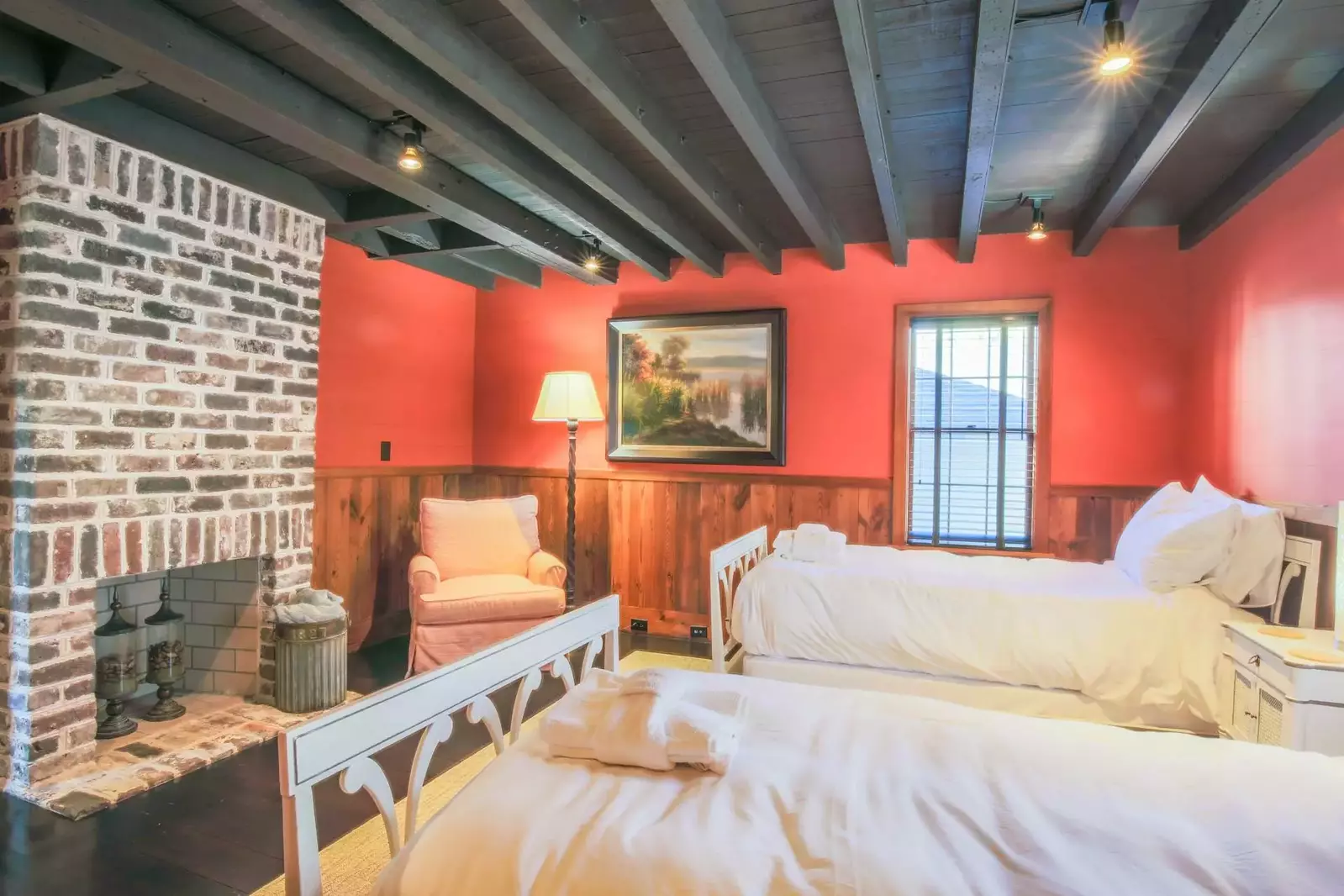 On the home's first floor, you'll find this bonus room with two twin beds.