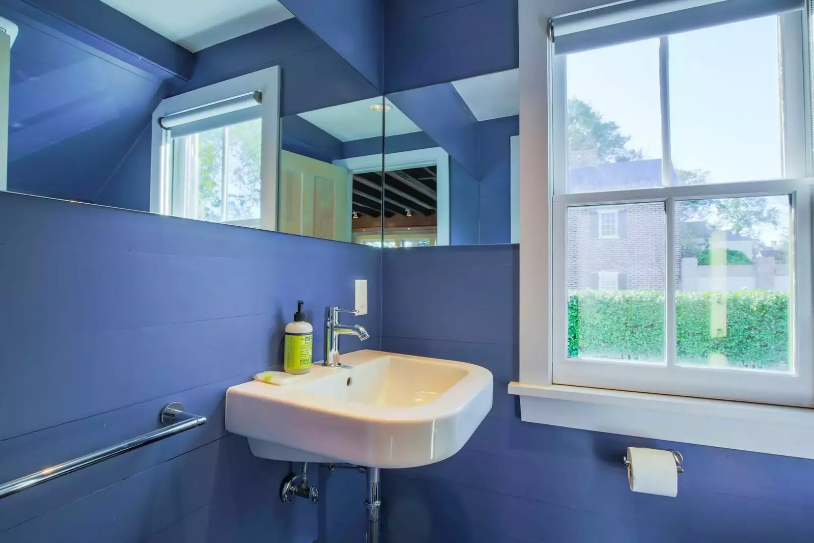 There is a half bathroom situated near the kitchen and the bonus room.