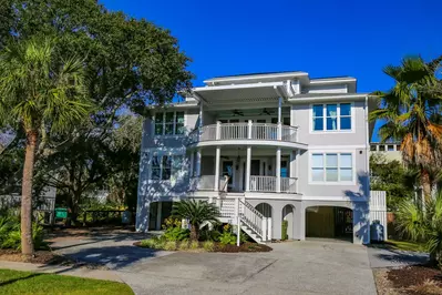 Sea Gem is a 3-story home across the street from the Isle of Palms beach.