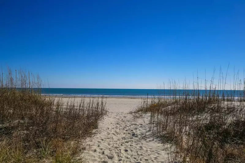You can dip your toes in the sand within minutes of walking out of the home!