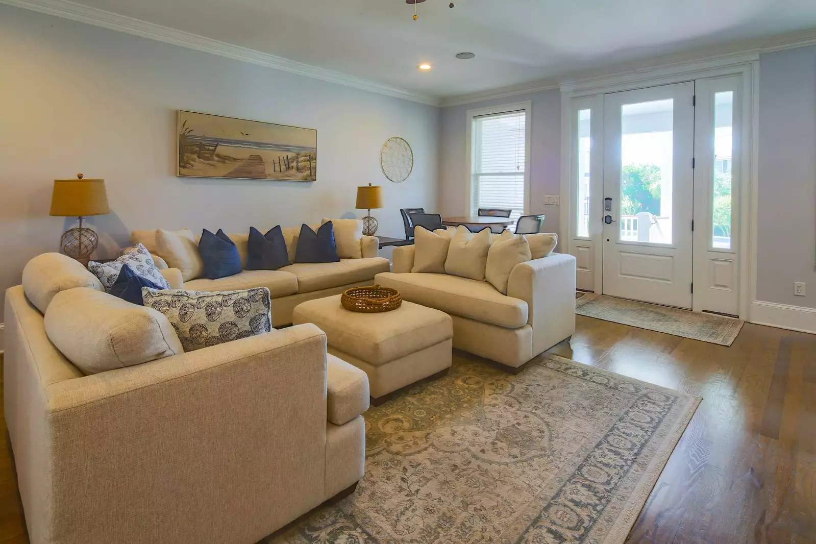 When you enter the home's front door, you'll find this comfortable den with spacious seating.
