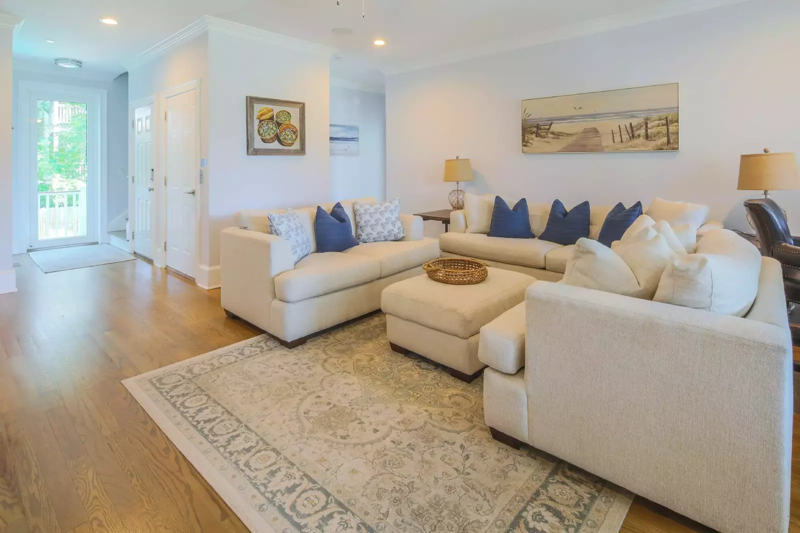 The lower level of the home features 4 bedrooms that are situated around this den.