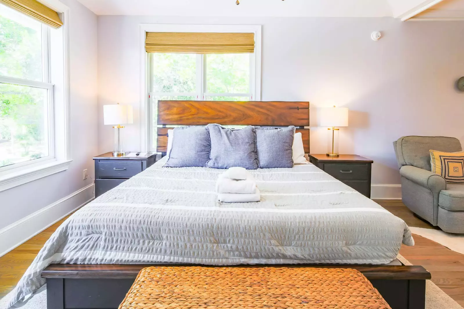 The master suite, which is located off of the living room on the second floor, features a king bed.