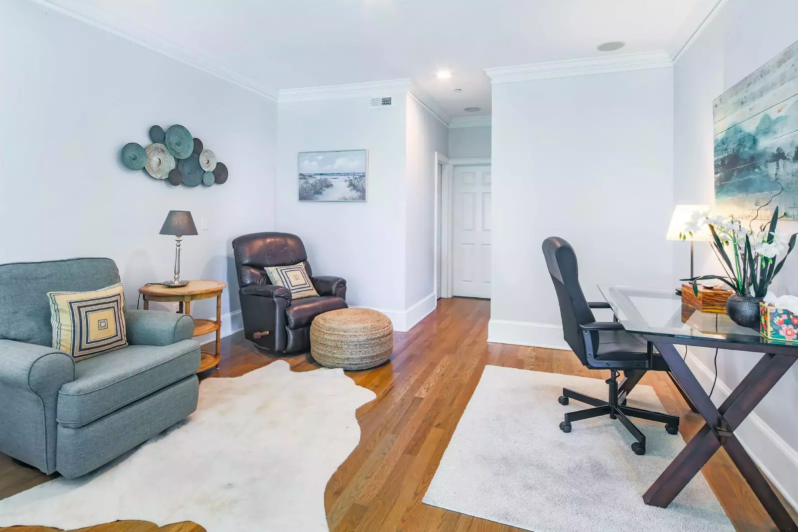 The master suite also features a seating area and desk.