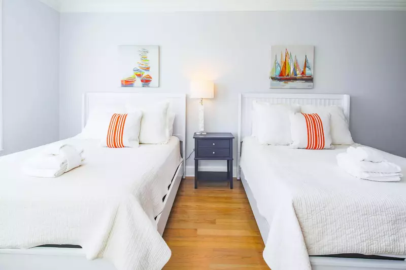 This guest bedroom receives terrific natural light.