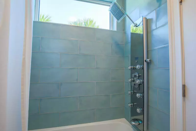 The Jack & Jill bathroom also has this tiled, shower/tub combo.