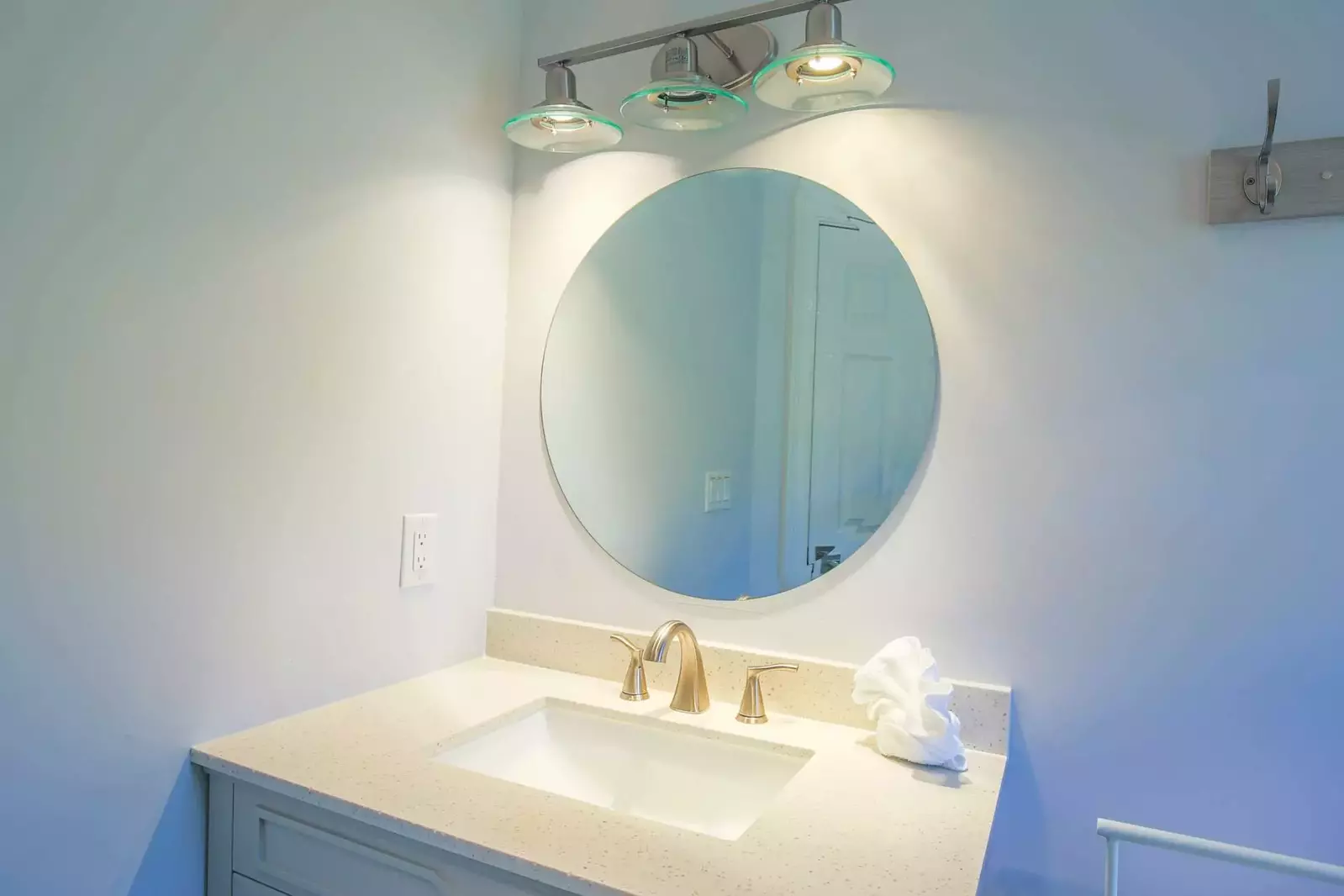 The third floor bathroom features a spacious vanity.