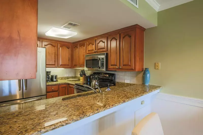 There's plenty of room in the kitchen for you to prepare meals for your family.