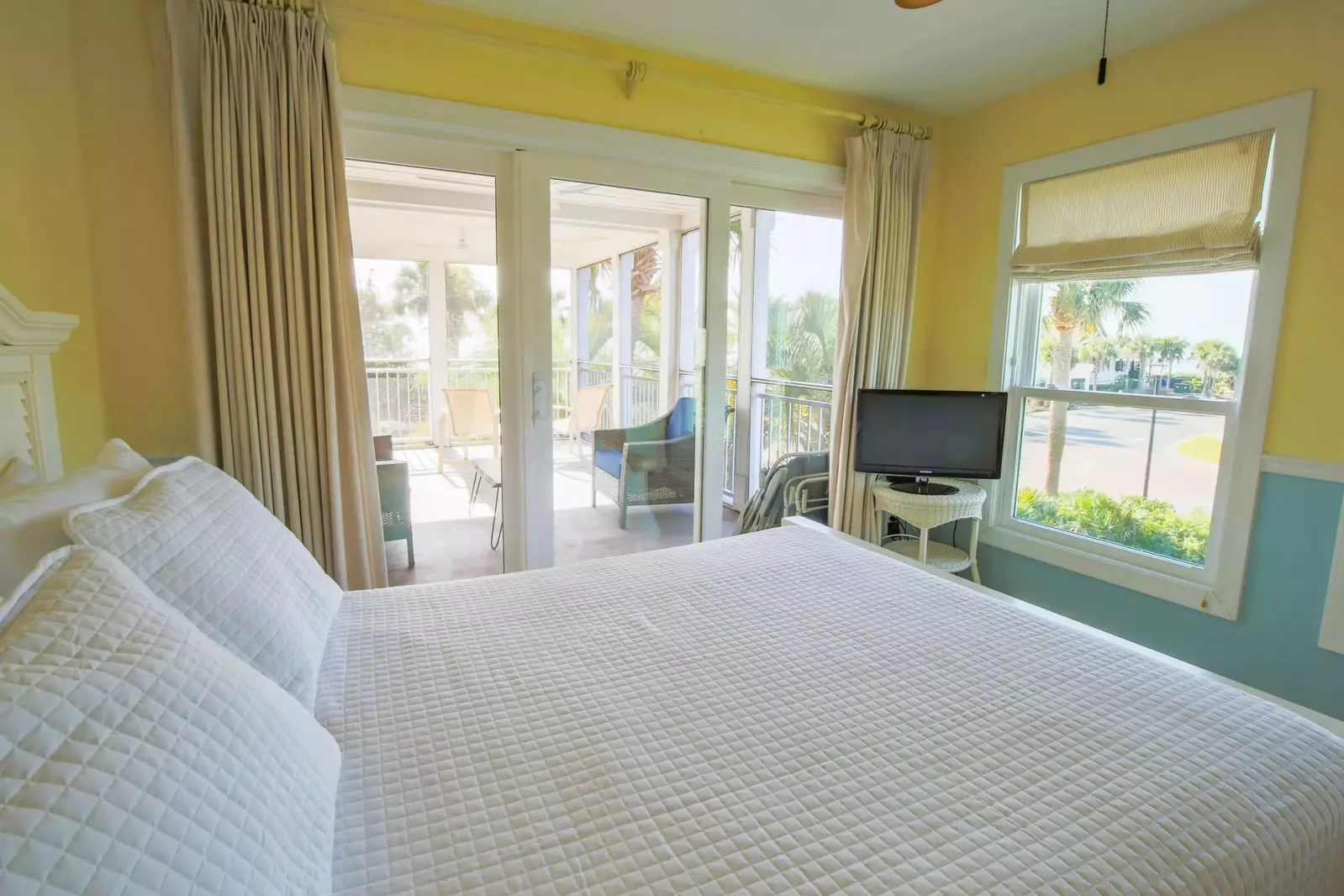 Open this sliding glass door to access the screened porch.