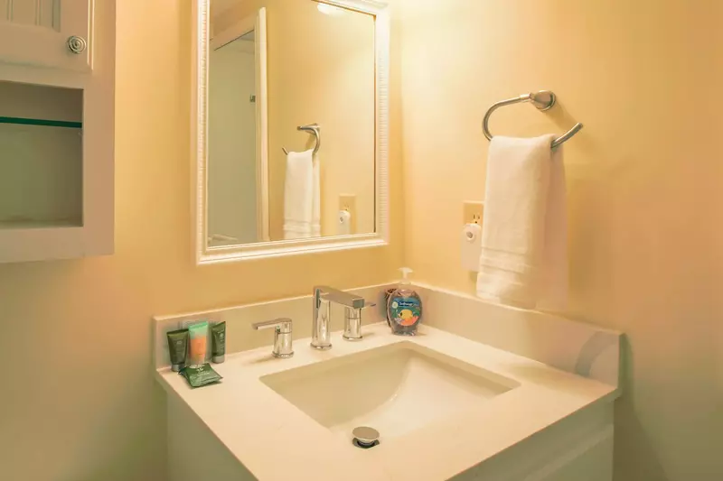 This vanity is located within the bathroom.