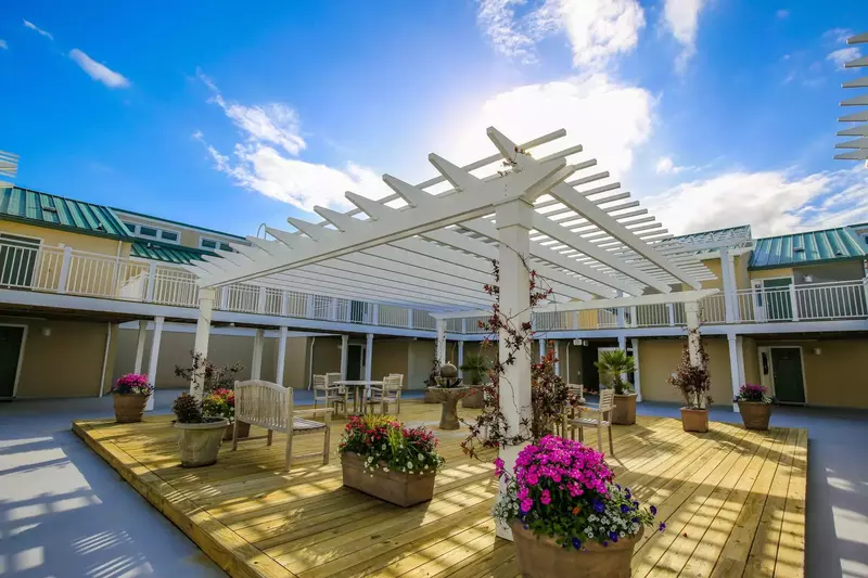 This courtyard on the top floor is shared by all residents of the Atrium Villas.