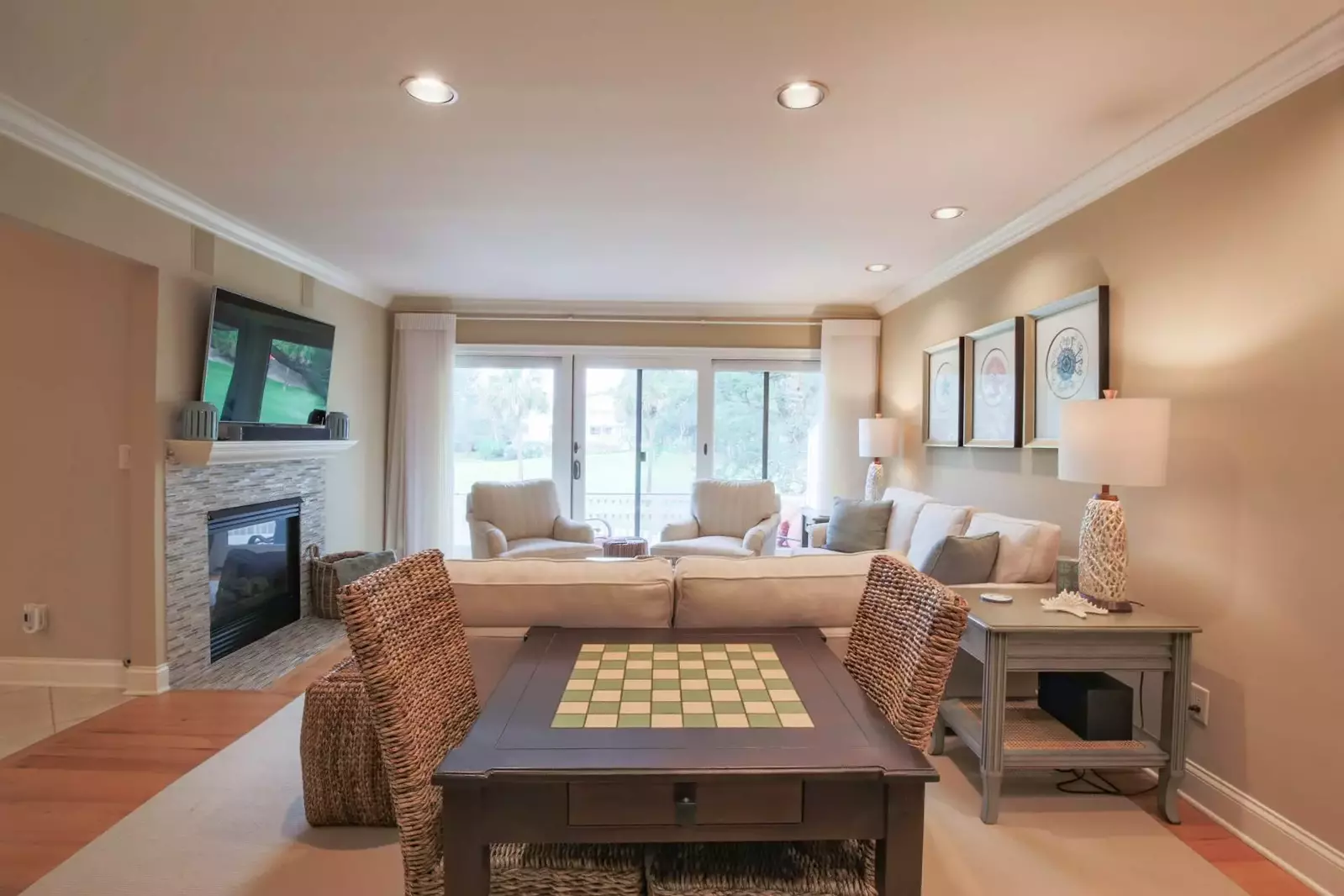 When you enter Fairway to Heaven, you will find an expansive living room with access to the back deck.