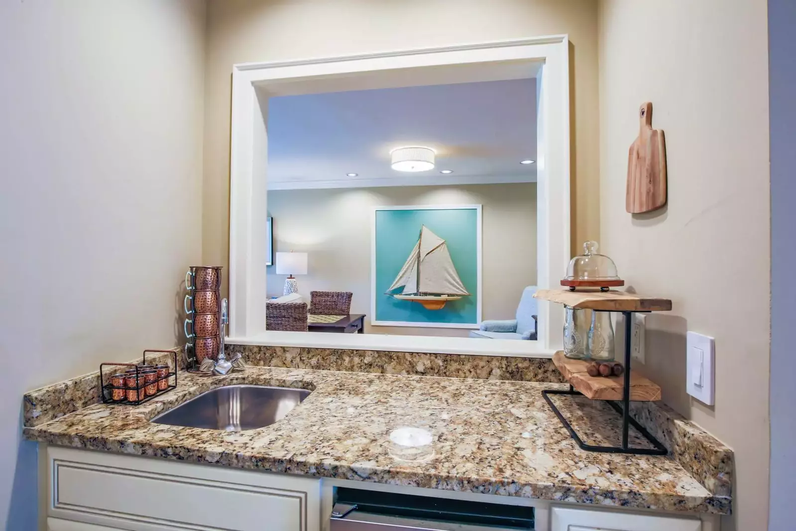 The butler's pantry features an ice maker and small sink.