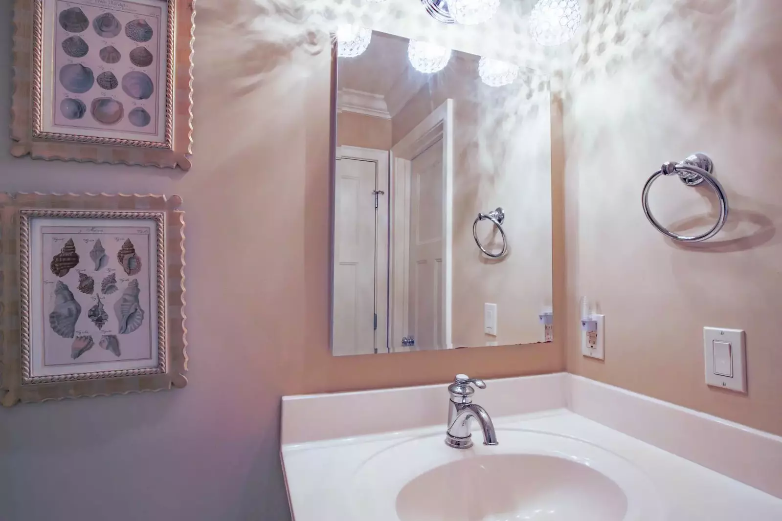 The bathroom features a vanity.