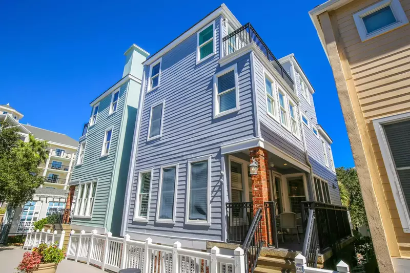 The boardwalk off of the home's back porch enables super quick access to the beach and community pools.