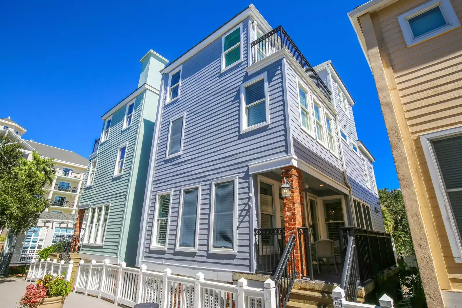 The boardwalk off of the home's back porch enables super quick access to the beach and community pools.