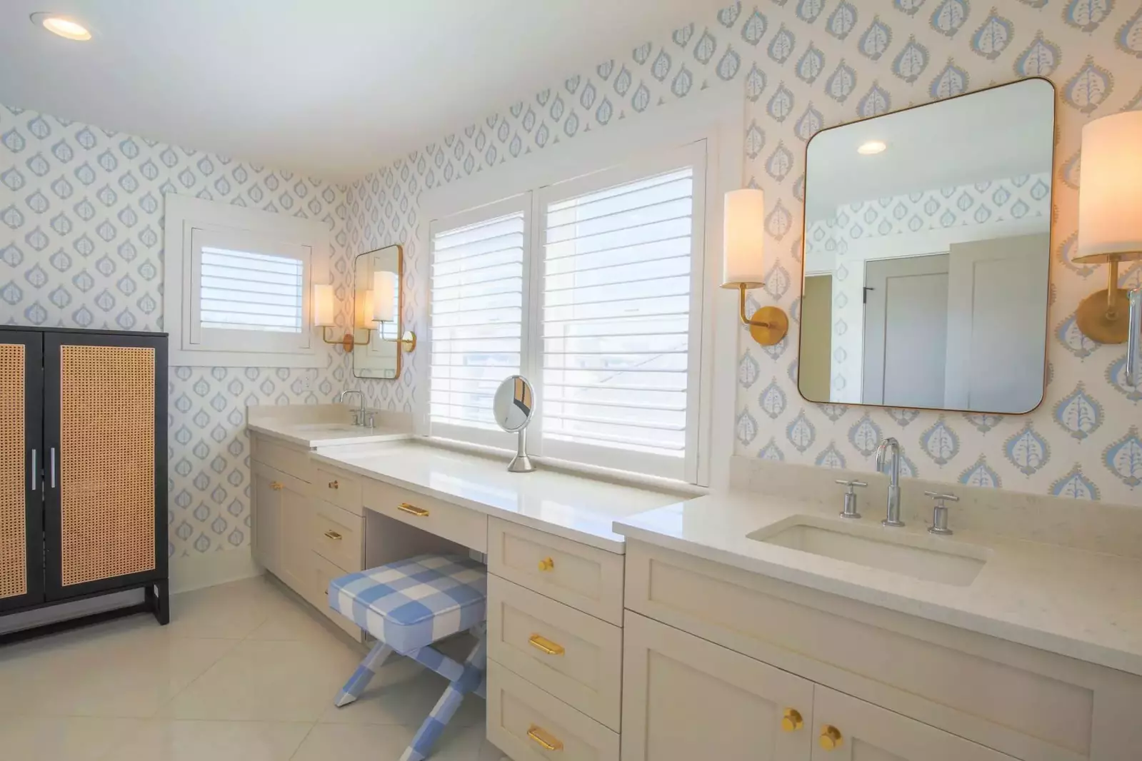 The master bathroom features a large, double sink vanity with quartz counters.