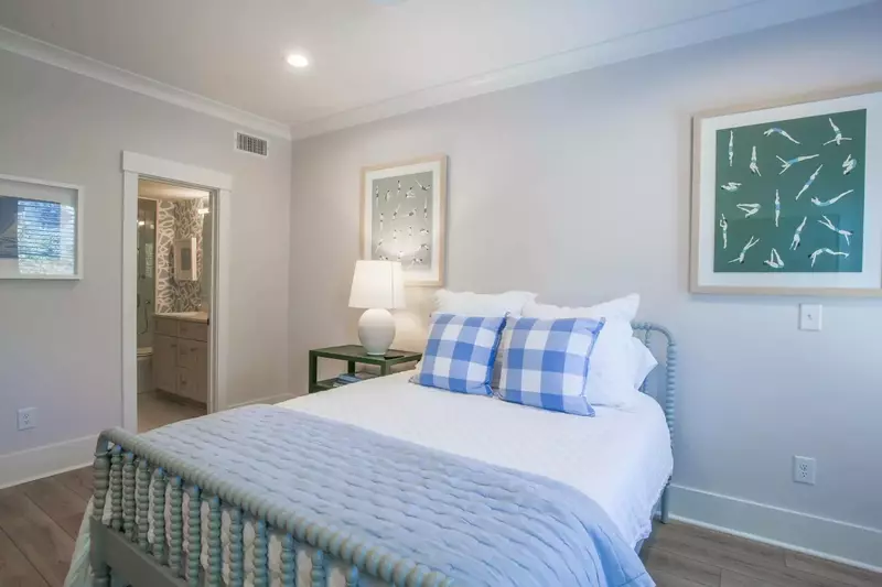 This guest bedroom also has access to a bathroom.