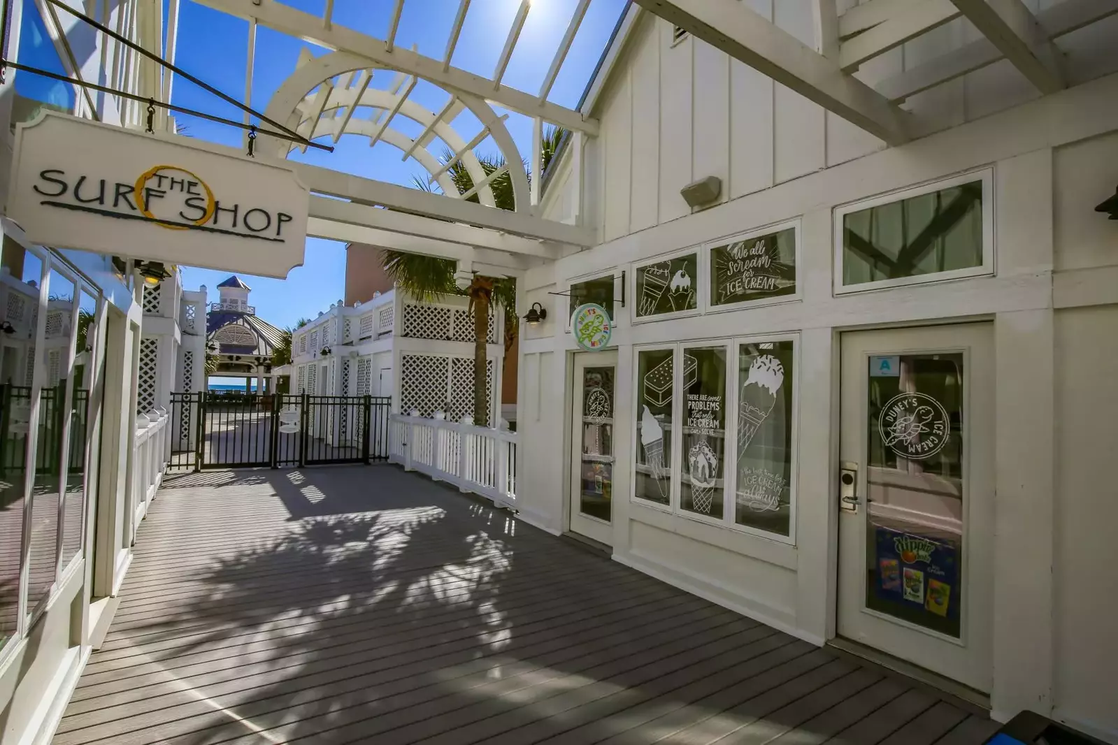 There's an ice cream shop and surf shop near the end of the boardwalk.