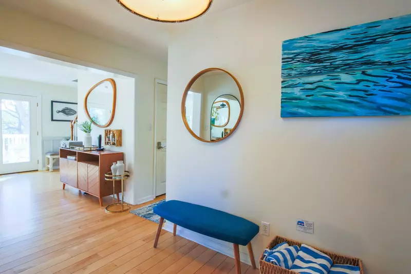 When you enter the front door, you'll find this entryway that leads to the living room, kitchen and bedrooms.