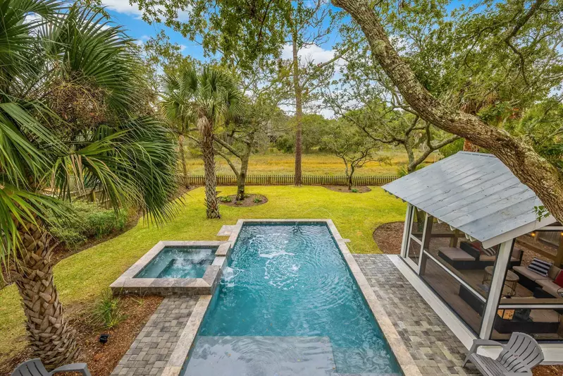 The private pool features both a Baja shelf at the top step.