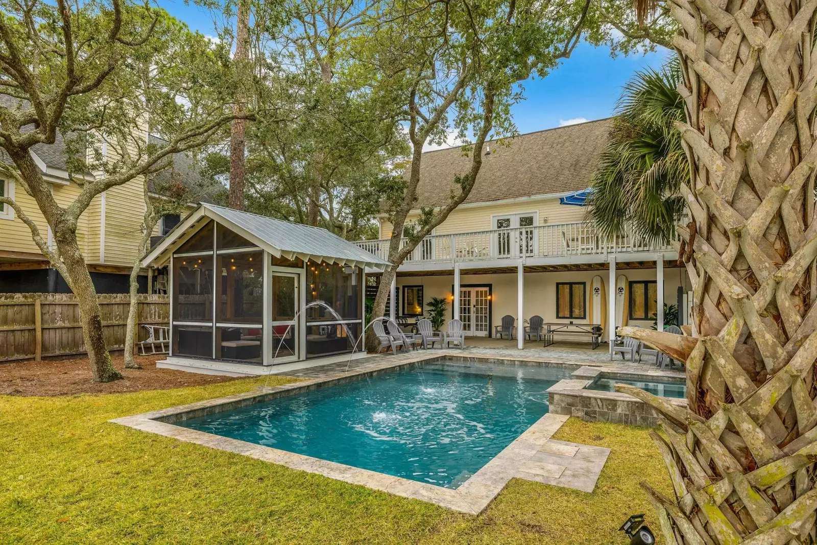 There is a screened gazebo adjacent to the pool.