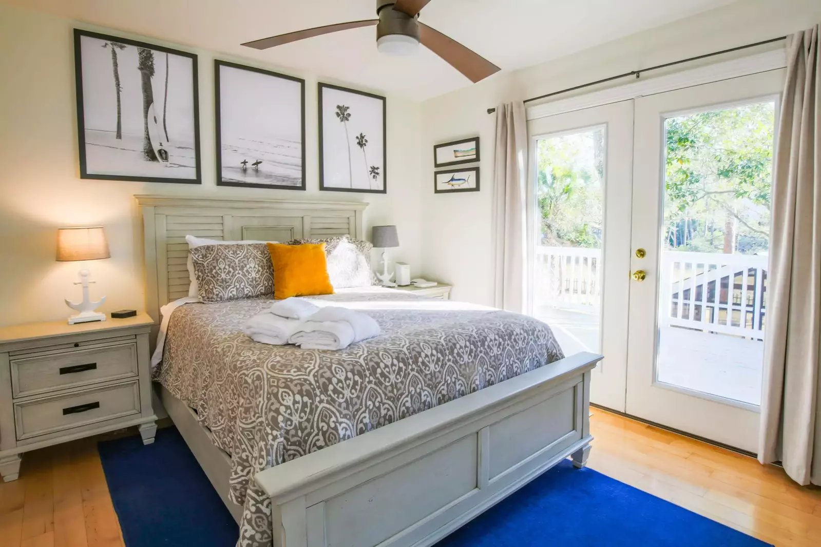 This bedroom also features access to the back porch.