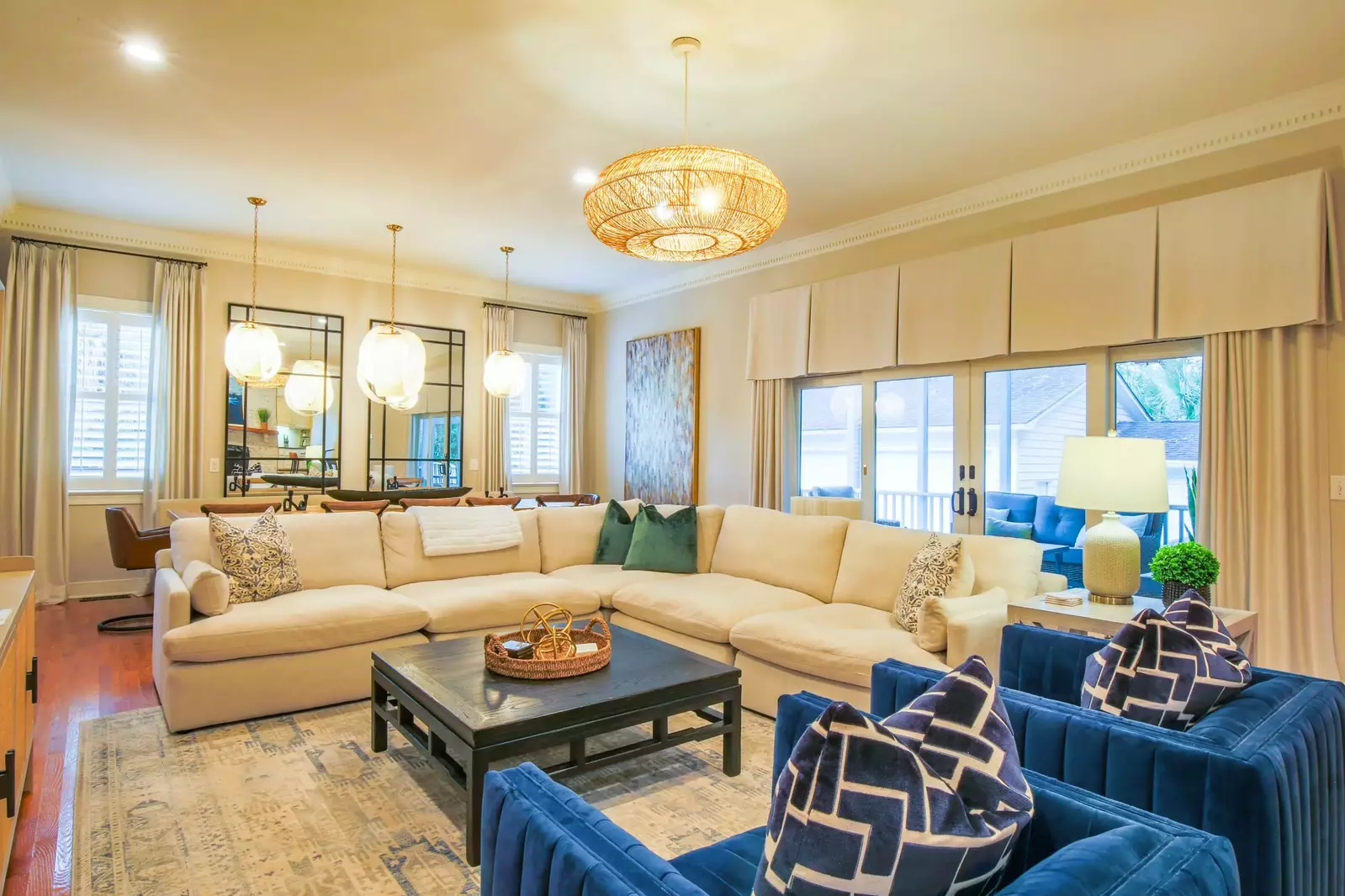 The sliding glass doors in the living room open up onto the screened porch.