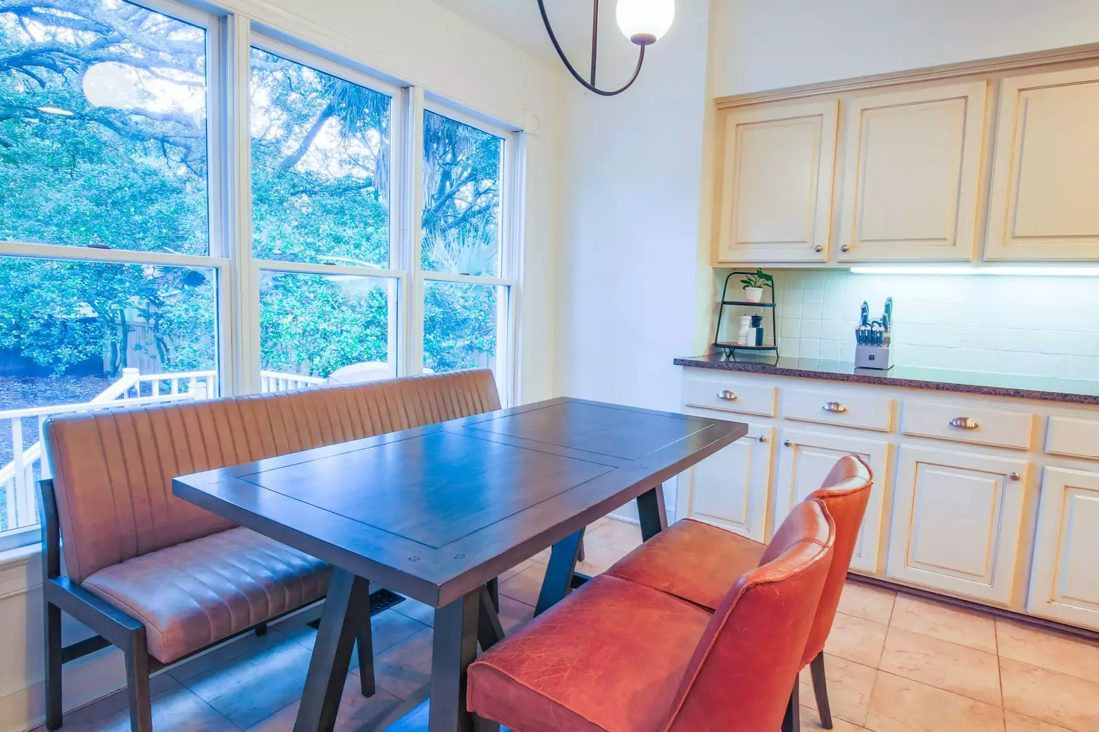 The kitchen table comfortably seats 5 people and there is additional seating at the dining table.