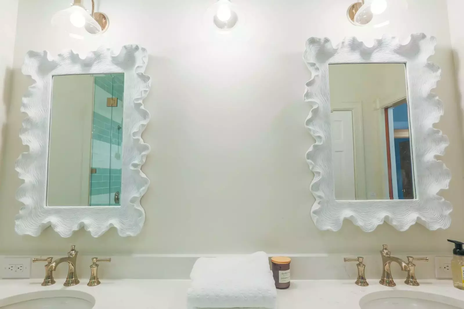 The en suite bathroom for the master bedroom features a double sink vanity.