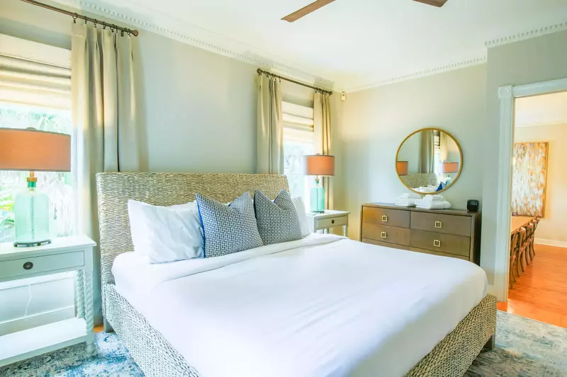 There is also a dresser, ceiling fan and en suite bathroom in the downstairs master suite.