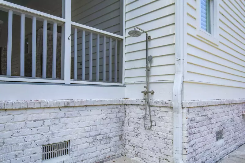 There is an outdoor shower alongside the driveway -- perfect for rinsing off the sand after you return from the beach.