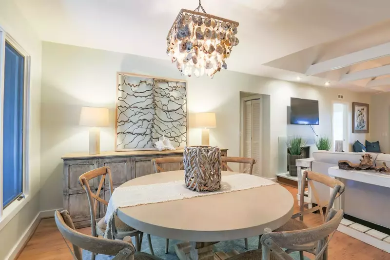 The dining table seats 6.