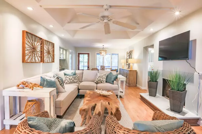There is an open floor plan layout between the dining room and living room.