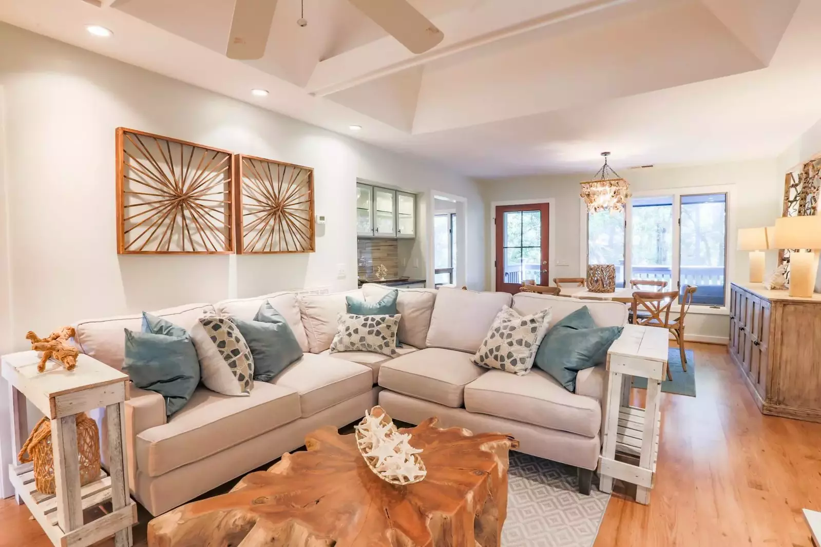 The home is centered around the living room with its spacious seating area and hardwood floors.