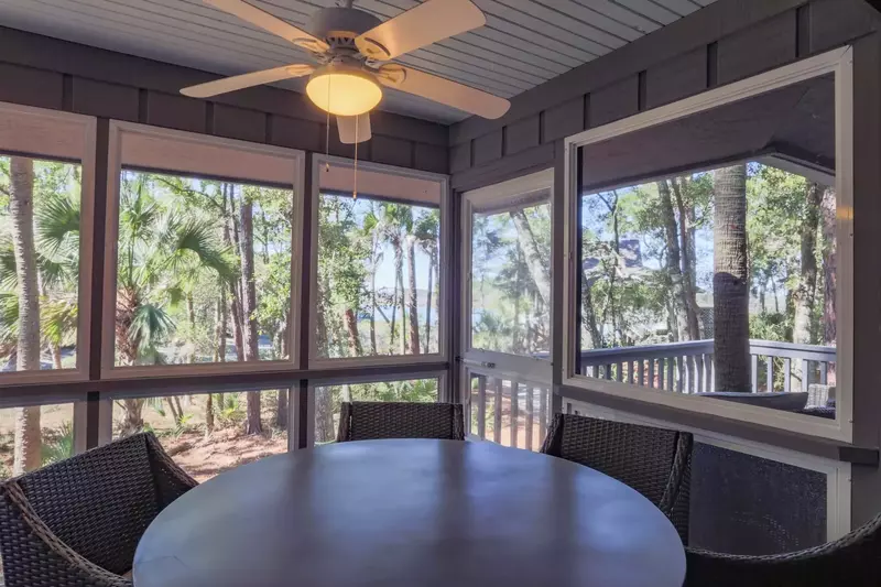 Dine al fresco to this beautiful view of the trees lining the Kiawah River.