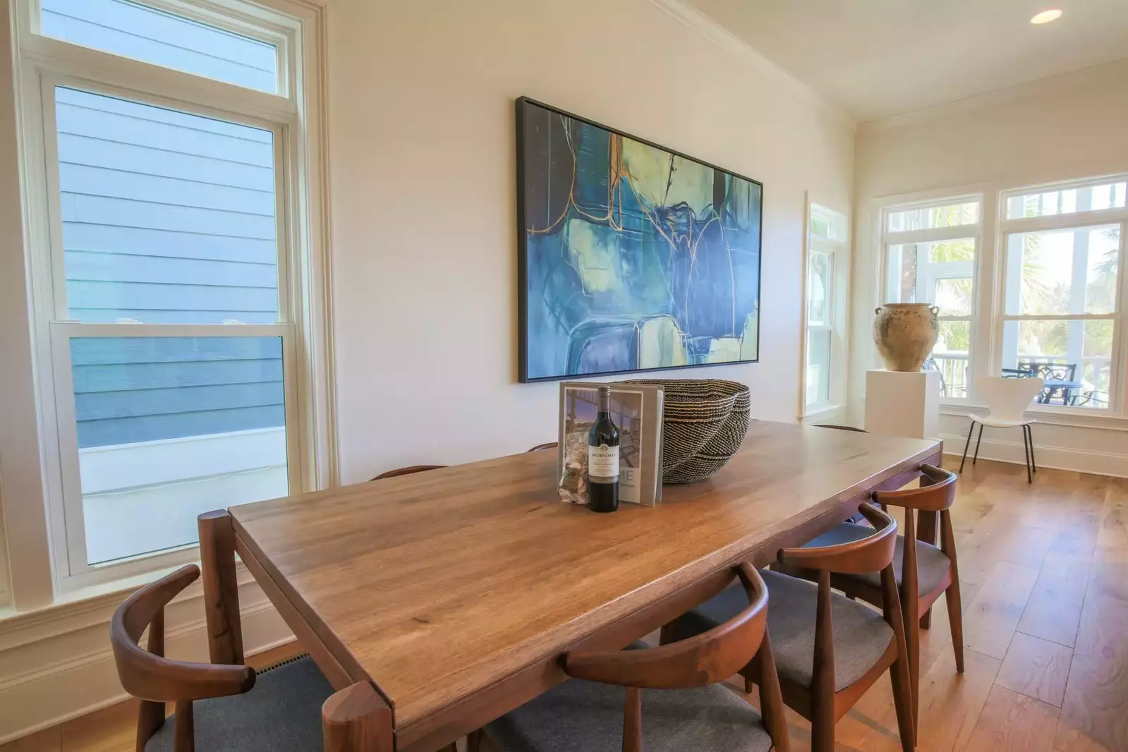 The dining table seats 8.  There are two additional outdoor dining tables on the screened porch.