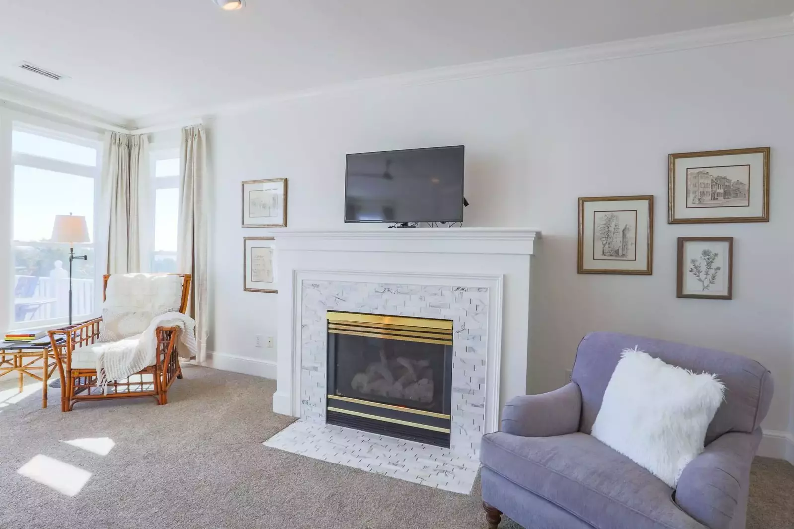The master suite also has a seating area and streaming TV.  (Fireplace is not operational.)