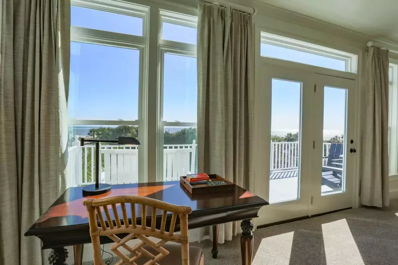 This desk near the master suite's private balcony is the perfect spot to make a call or get some work done.